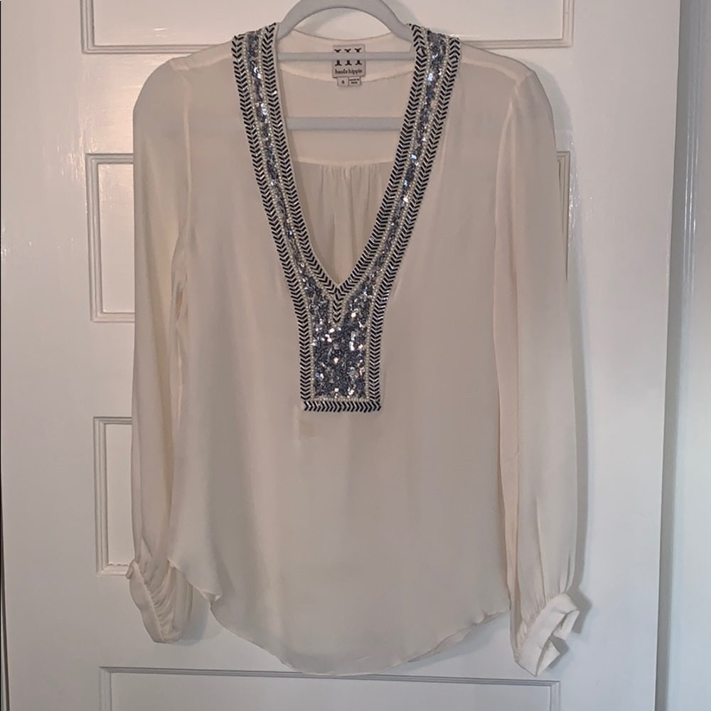 Blouse with sequin neckline